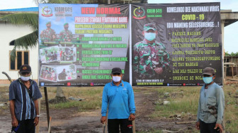 Tokoh Masyarakat Labuhan Pering Apresiasi Pemasangan Banner New Normal oleh Satgas TMMD