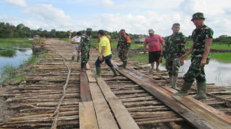 Papan Galar Jalan TMMD Sungaiterap Dipasang