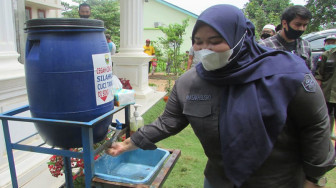 Masnah Beri Contoh Patuh Protokol Kesehatan