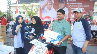 SKK Migas - PetroChina Hadiahkan 1 Unit Motor, 3 Kulkas dan 20 Payung di Acara Jalan Santai Pemprov Jambi