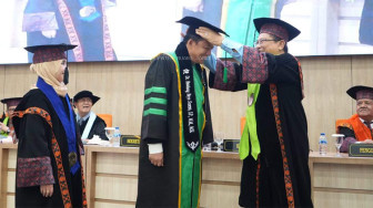 Bupati Muaro Jambi Resmi Sandang Gelar Doktor, Angkat Tema Kesejahteraan Petani Sawit