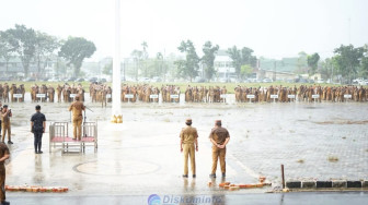 Diguyur Hujan, Bupati Muaro Jambi, Dr. Bambang Bayu Suseno Pimpin Apel Perdana Pasca libur Hari Raya Idul Fitri 1447 Hijriah/2026